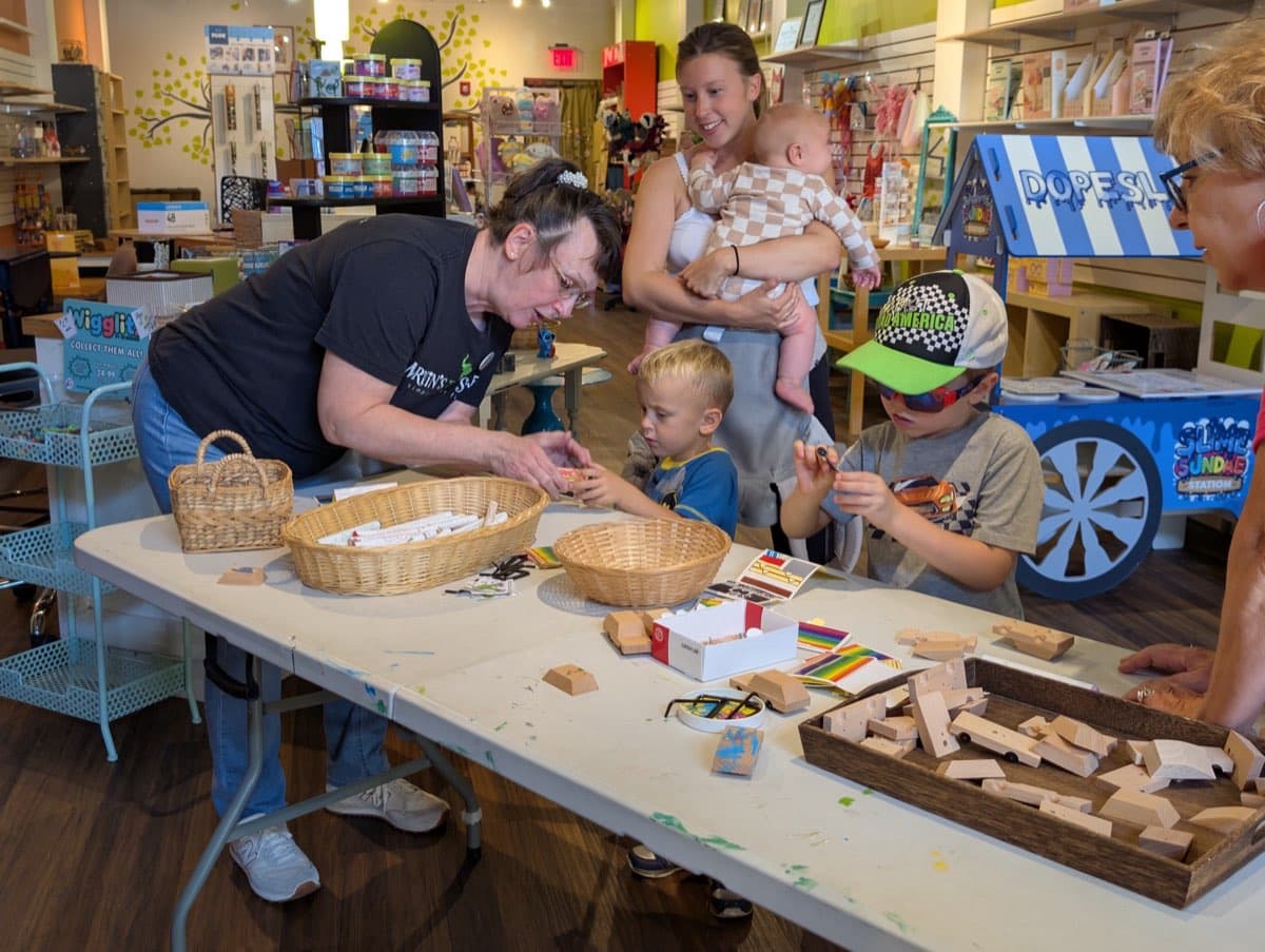 Families doing craft activities at the event