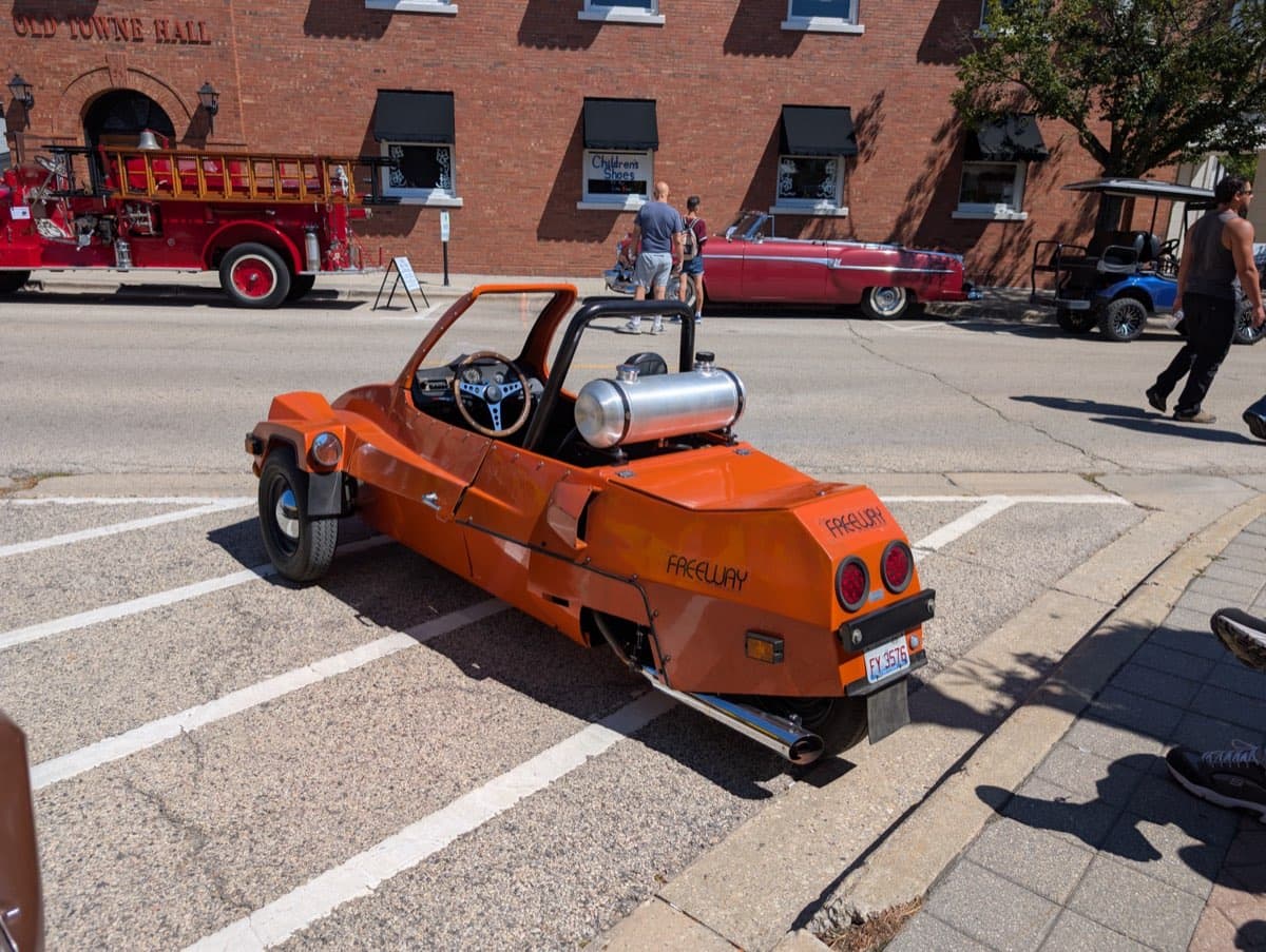 Orange enclosed hot rod