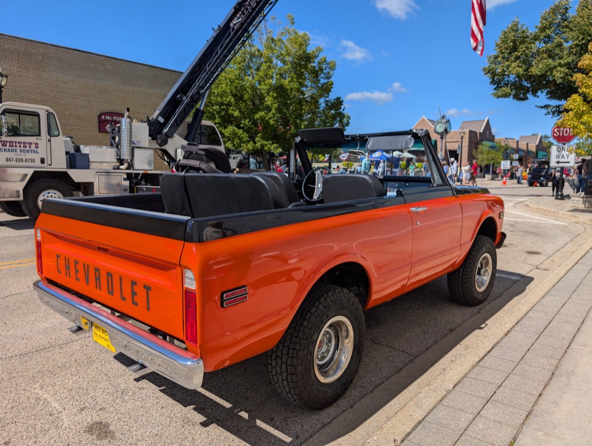 Orange Chevy Blazer convertible on Williams Street